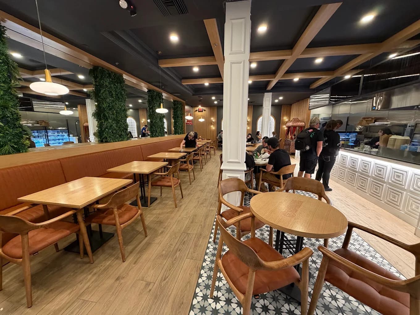 Istanbul Mediterranean Fremont dining room with green walls and warm lighting